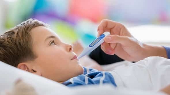 checking child temperature