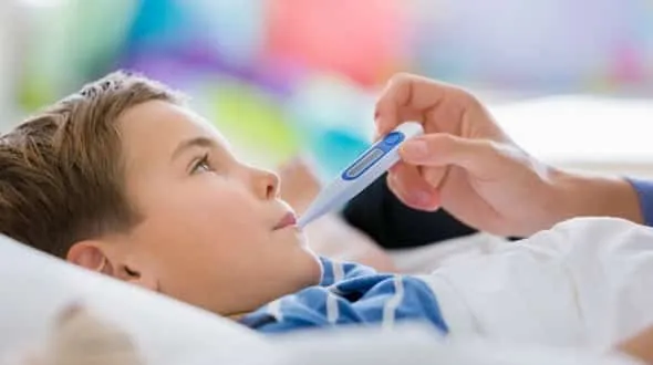 checking child temperature