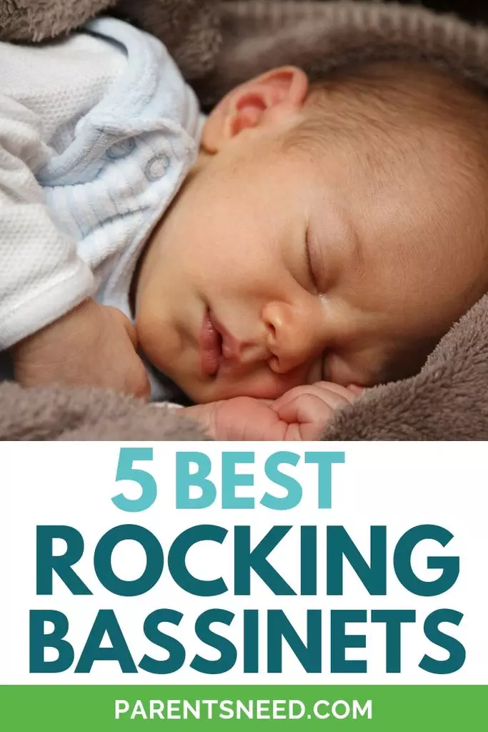 Baby sleeping soundly in a rocking bassinet