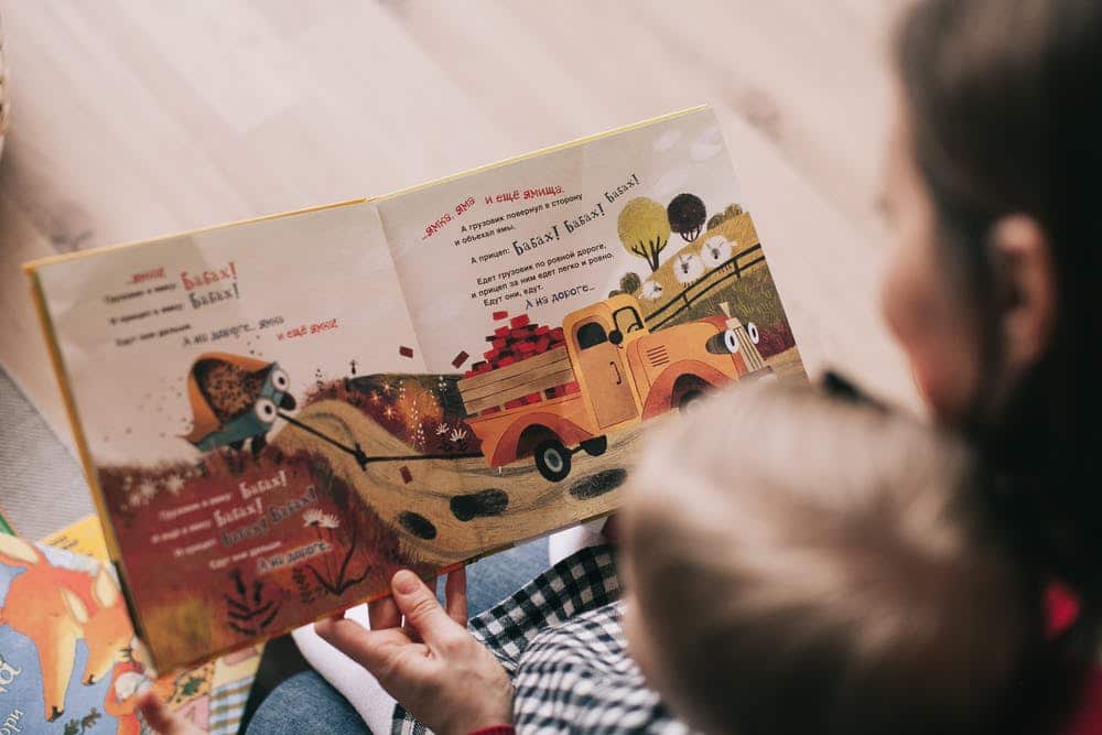 A Parent reading with her child