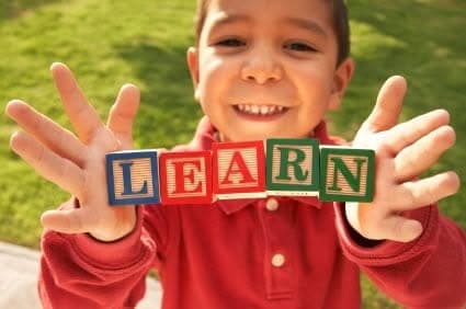 helping your baby achieve certain physical and cognitive milestones